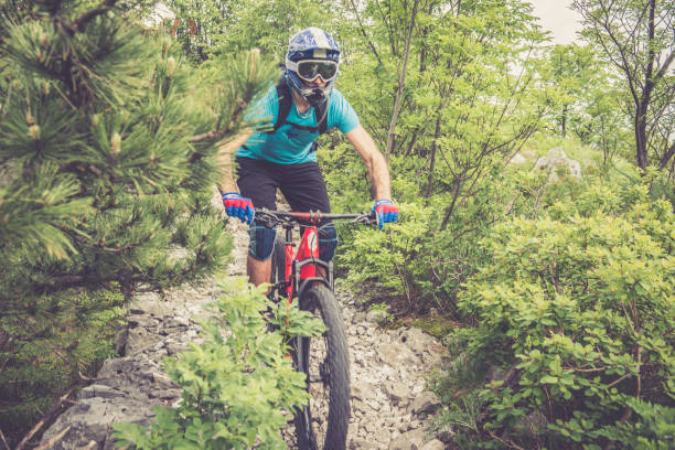 istock Enduro All Mountain E bike rider - adrenaline MTB trail 681236024