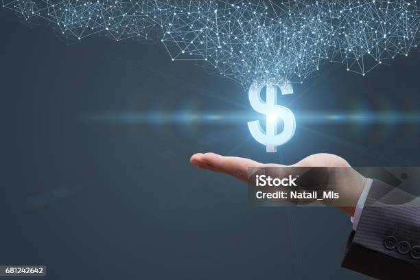 In The Hands Appears With A Dollar Sign Stock Photo - Download Image Now - Perks, Dollar Sign, Financial Loan