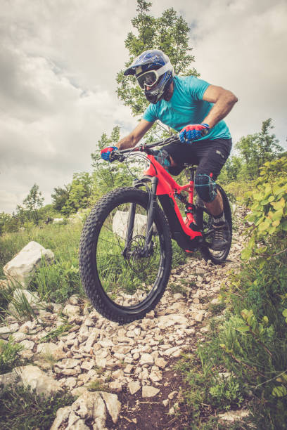 istock Enduro All Mountain E bike rider - adrenaline MTB trail 681258718