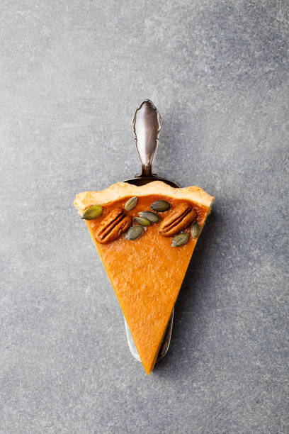istock Pumpkin pie, tart made for Thanksgiving day. Grey stone background. Top view 681271982