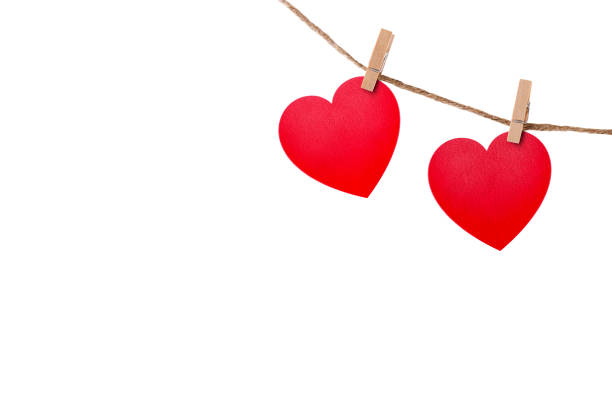 istock Love hearts hanging on rope on white 681278966
