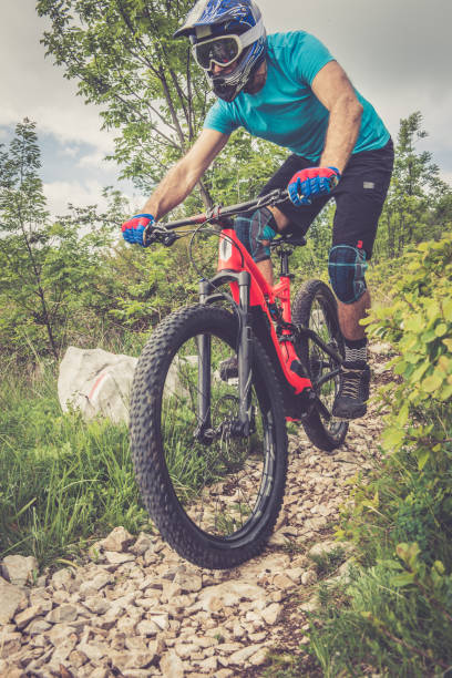 istock Enduro All Mountain E bike rider - adrenaline MTB trail 681279042