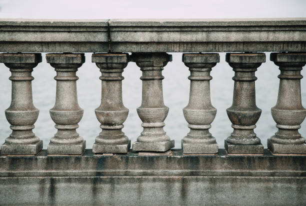 old stone balustrade of railing - unevenly imagens e fotografias de stock