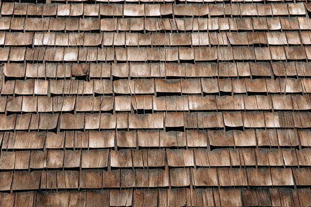 istock weathered wooden shingles on a roof 681312476