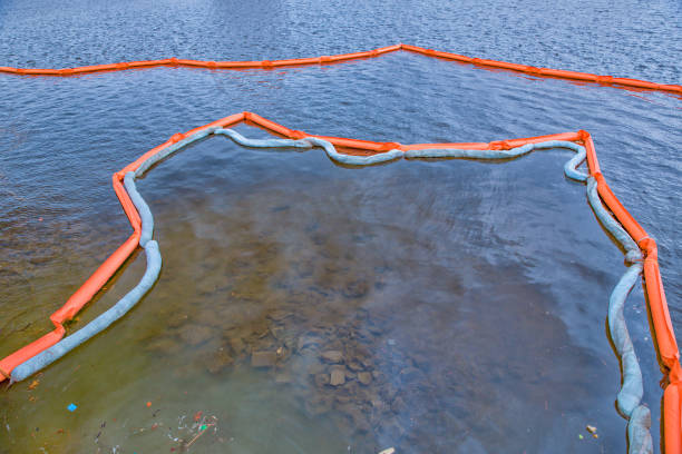 istock permanent debris booms. barrier to floating trash on the river 681312510
