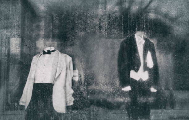 istock mannequins in the window behind dirty glass 681312576
