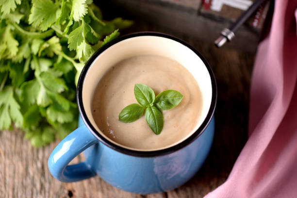 istock Chicken cream soup with cheese in mug. 681317766