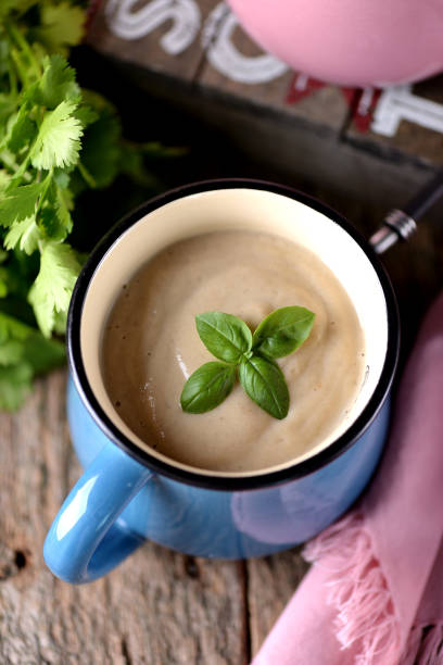 istock Chicken cream soup with cheese in mug. 681317786