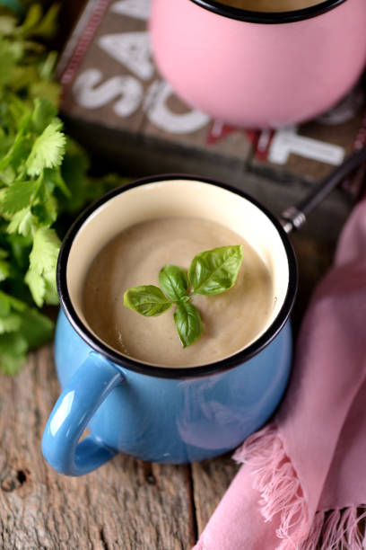 istock Chicken cream soup with cheese in mug. 681317802