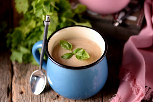 istock Chicken cream soup with cheese in mug. 681317858
