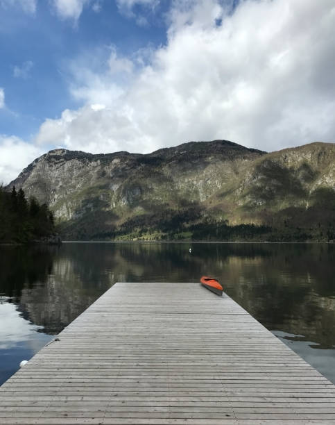 istock Mountain lake orange kayak mobile photo 681319234