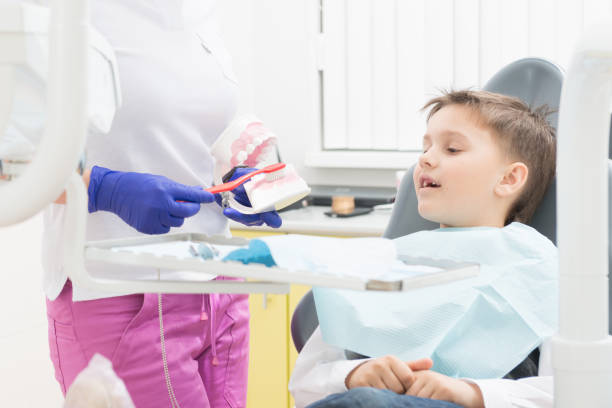 istock The boy heals teeth at the dentist 681325882