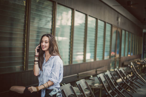 istock Cute girl talks on mobile 681355374