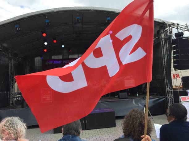 Berlin, Germany - May 1, 2017: SPD flag Berlin, Germany - May 1, 2017: SPD flag. The Social Democratic Party of Germany (German: Sozialdemokratische Partei Deutschlands) is a social-democratic political party in Germany marxism stock pictures, royalty-free photos & images