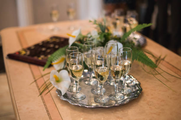 istock glasses of champagne on the table 681381316