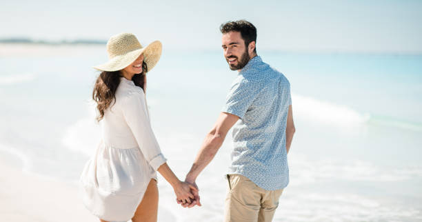 istock happiness couple doing a vacation at seaside 681394974