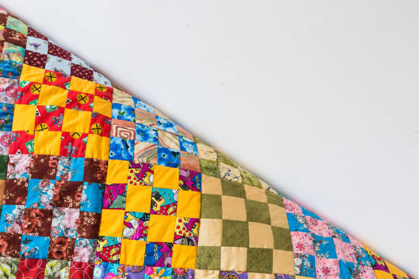 istock homemade, patchwork, quilting, sewing, comfort concept - multicolored handmaded blanket in best russian traditions made of textile squares with floral and abstract prints. with empty space for text 681397206
