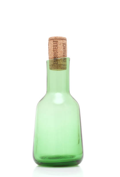 istock Green bottle with cork isolated on white 681487340