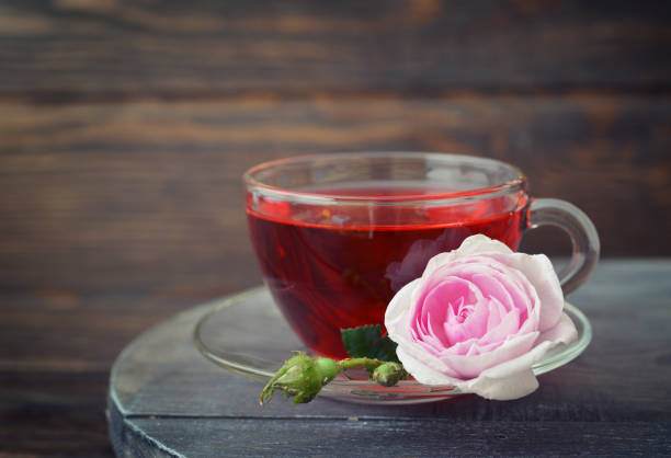 istock Tea rose flowers and tea 681498386