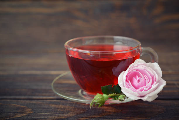 istock Tea rose flowers and tea 681498398