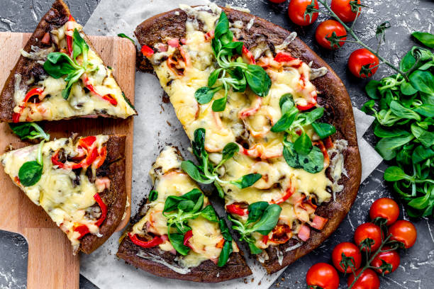 istock ingredients and vegetarian pizza on blue stone table background top view 681500028