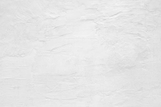 istock white wall on the street, light texture urban background 681514538