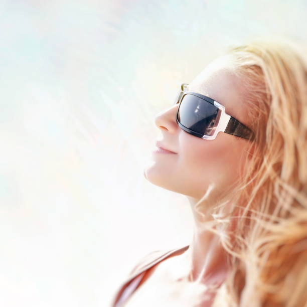 istock Beautiful blond woman on sunny day 681526382
