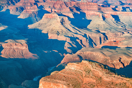 Landscape stock photograph overlooking the Grand Canyon and the Colorado River at the bottom as seen from Hopi Point, Grand Canyon National Park, South Rim, Arizona, USA.