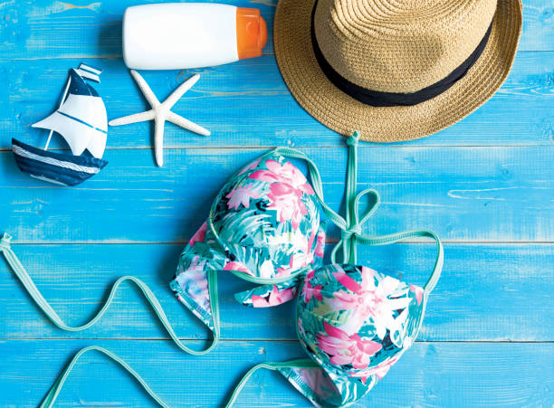 istock Women's summer beach clothes background 681592298