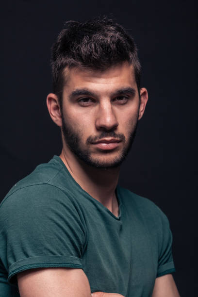 istock one young handsome man, looking at the camera, face head closeup 681602050