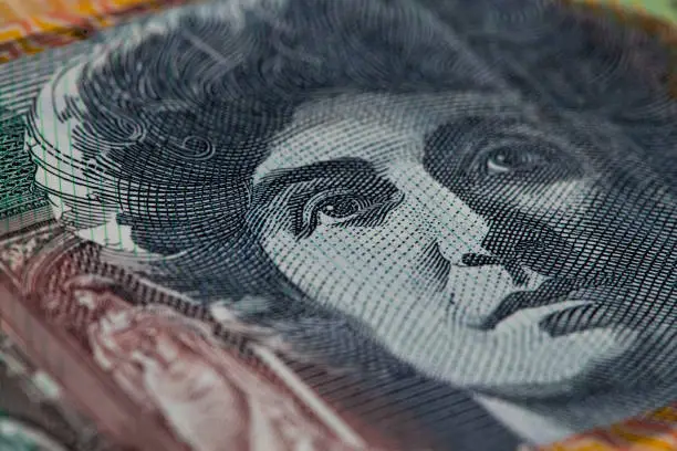 Extreme closeup of Dame Nellie Melba printed on Australian one hundred dollar bill