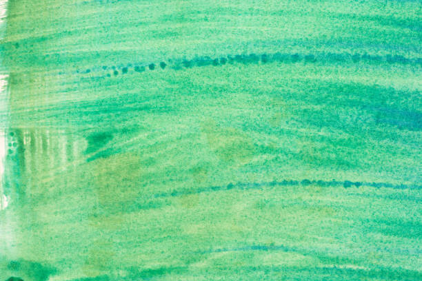 istock green watercolor painted texture background 681615232