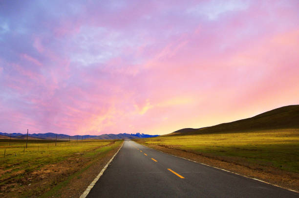 istock Winding road along the green meadows 681615458