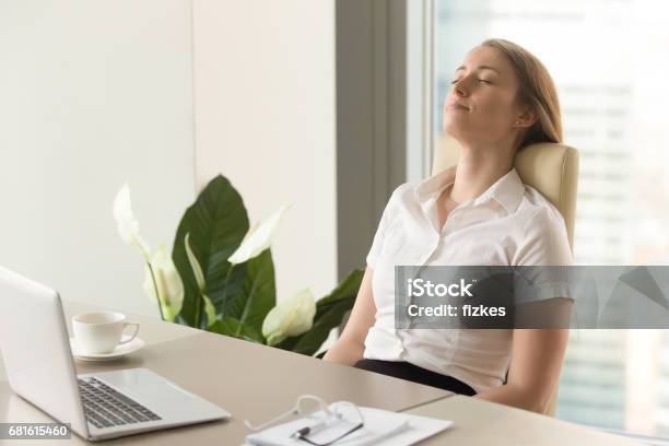 Businesswoman Takes Short Timeout In Office Work Stock Photo - Download Image Now - Breathing Exercise, Office, Sleeping