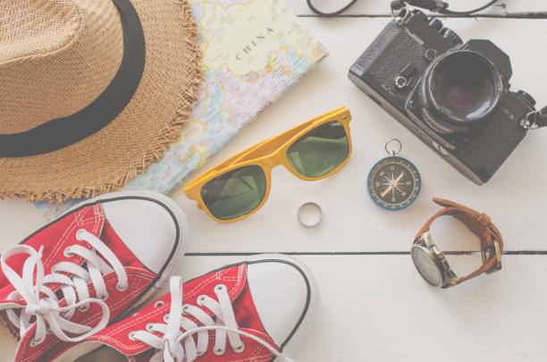 istock Travel accessories on white wooden 681619398