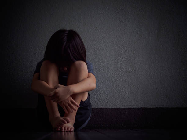 little boy unhappy sad and tress alone - domestic violence imagens e fotografias de stock