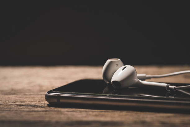 istock Headphone and phone media portable on dark tone. 681622500