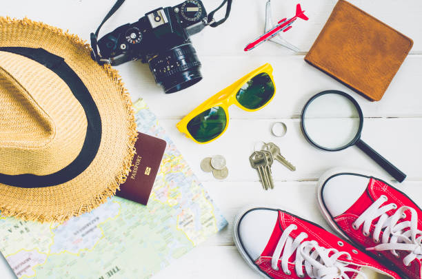 istock Travel accessories and costume on white background 681625476