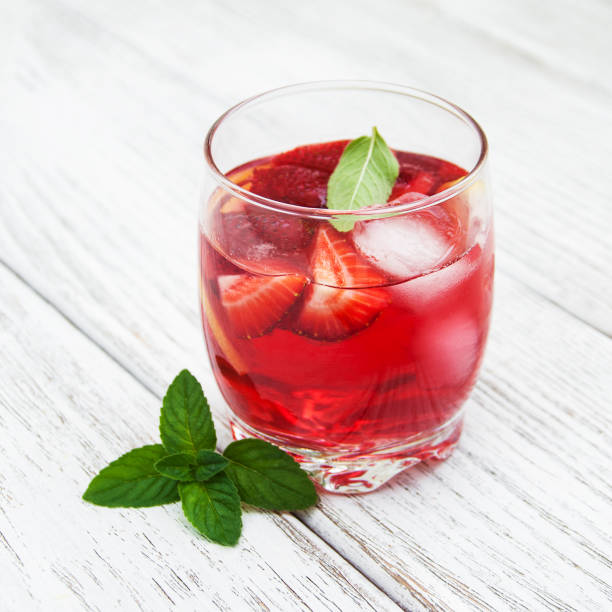 istock Glass of lemonade with strawberries 681629206