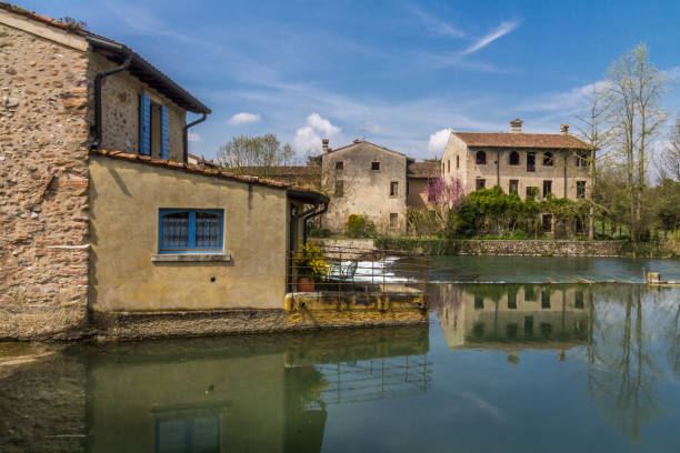 istock Tuscany village by a lake 681631882