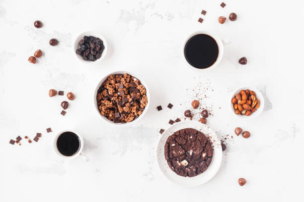 istock Cups of coffee, chocolate cake, chocolate muesli 681639434