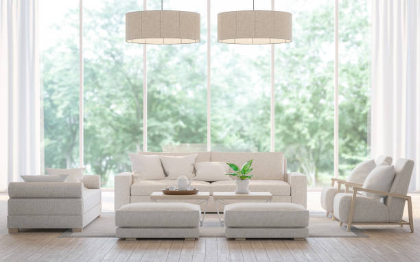 Modern white  living room in the forest 3d rendering image Modern white  living room in the forest 3d rendering image.There is a large sofa set, wooden floors and large glass windows. Can look out to see the beautiful nature. bay window stock pictures, royalty-free photos & images