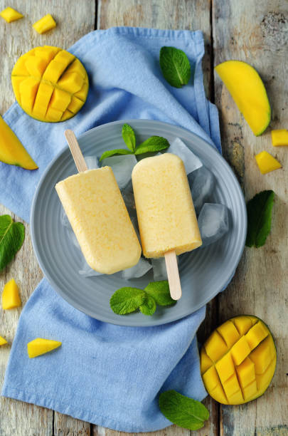 istock Creamy mango ice cream with fruits and ices 681643718