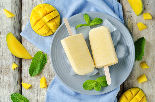 istock Creamy mango ice cream with fruits and ices 681643738