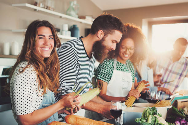 istock Multiracial friends cook tasteful food. 681650002