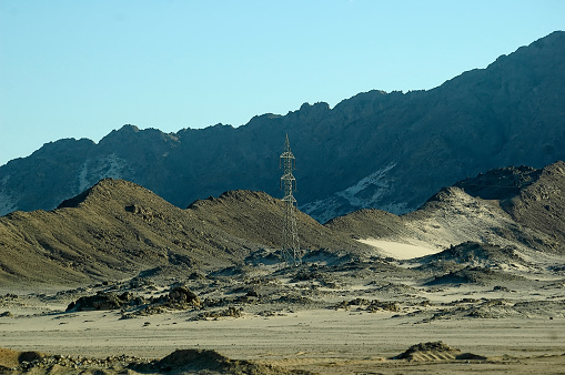 Electricity tower in desert on the Red sea governorate, Egypt. Africa