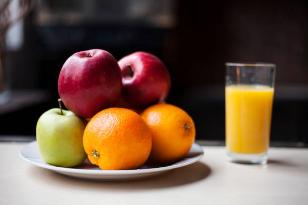 istock Fruits with orange juice in glass 681681812