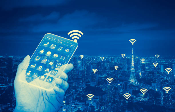 istock duo tone graphic of smart phone and smart city, wireless communication network 681681982