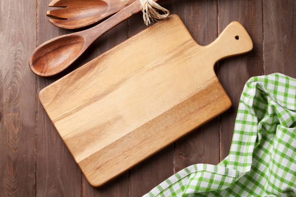 istock Cooking utensils on wooden table 681689582