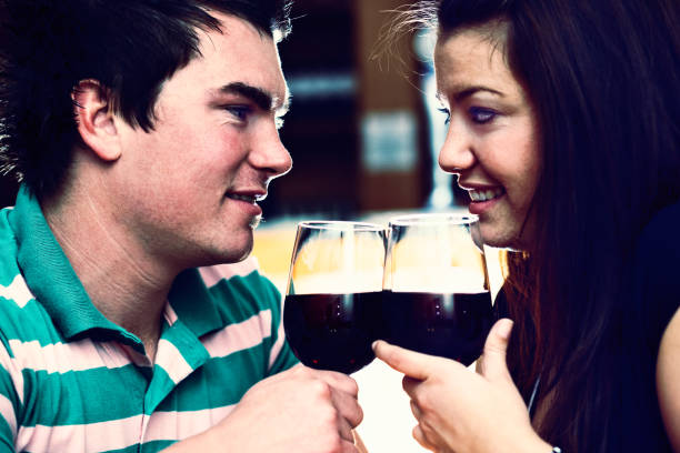 istock Romantic young couple toast each other, smiling, so in love 681689658